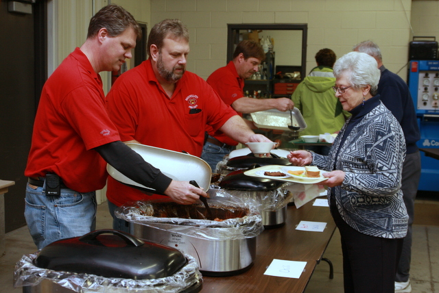 firefighters serving soup in Iowa