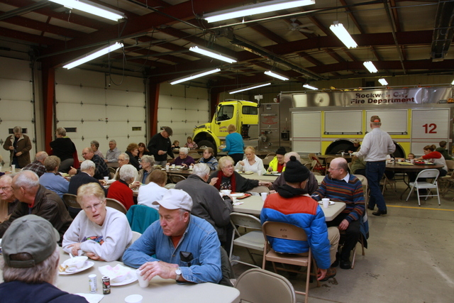 crowd enjoys soup at fire station 