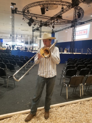 Farmer Derek from Kansas and his trombone, calling the cows 